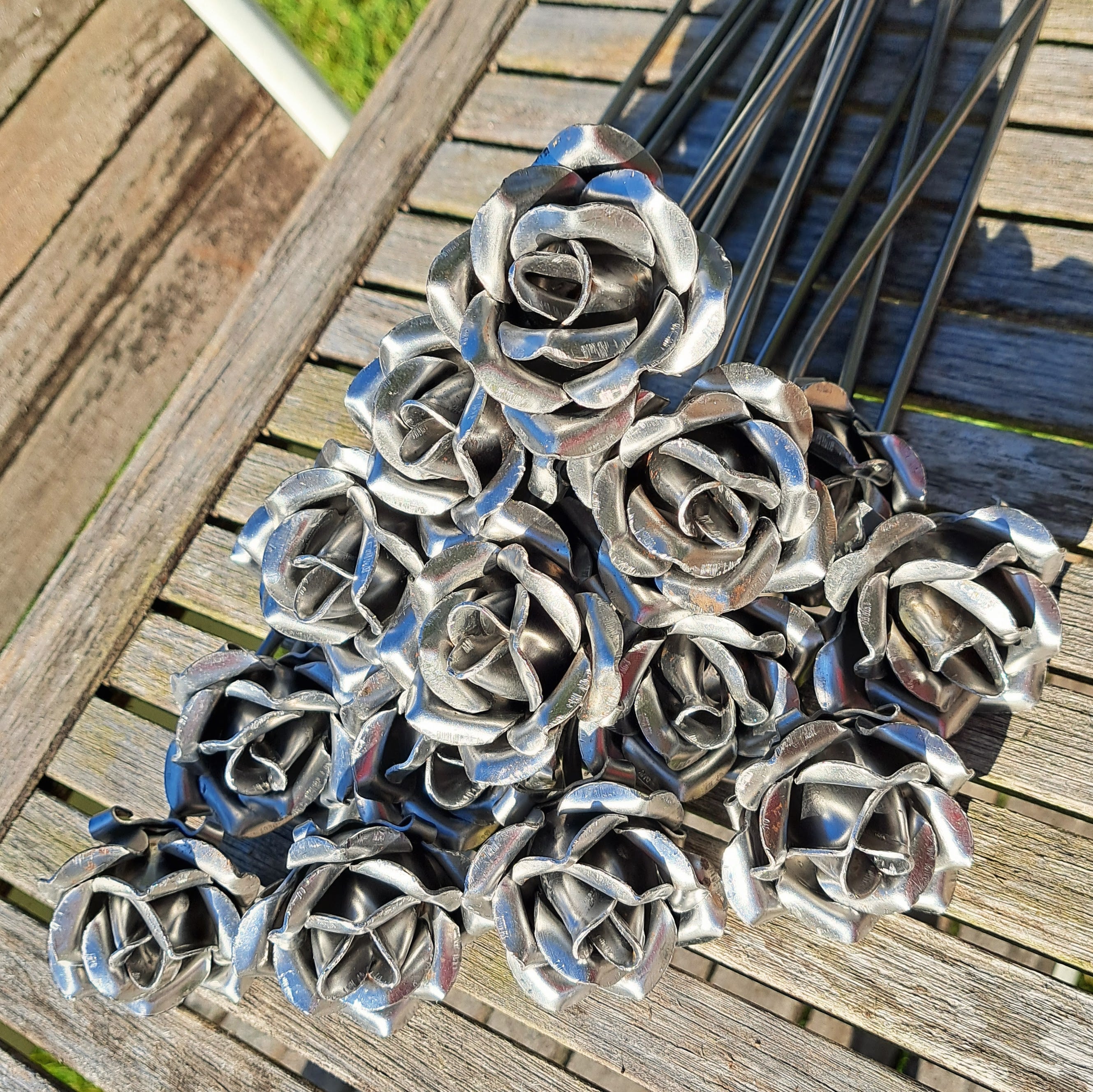 A close up of a bunch of untreated raw steel roses